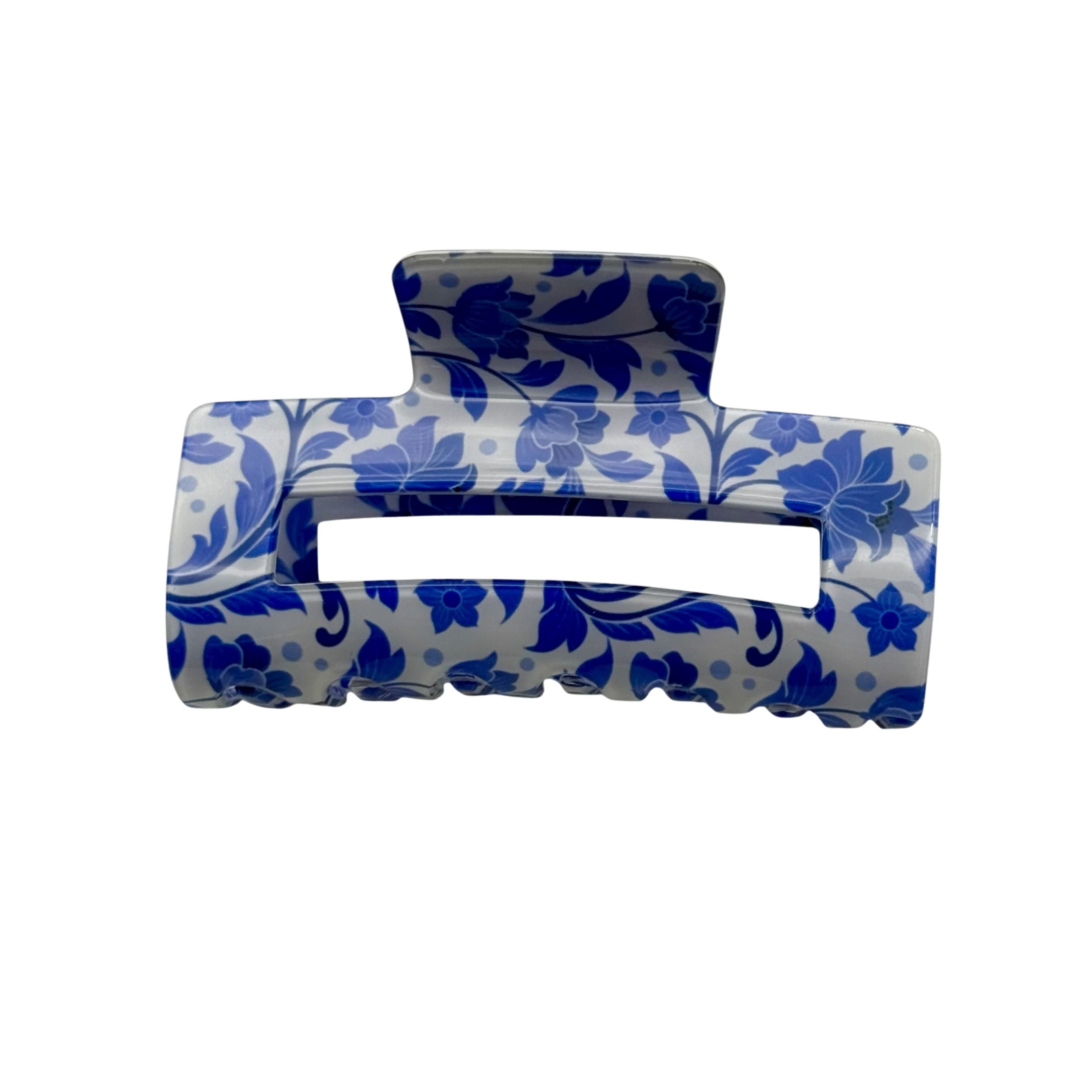 https://cdn.shopify.com/s/files/1/1645/4619/files/BlueFloralHairClaw.jpg?v=1759329568