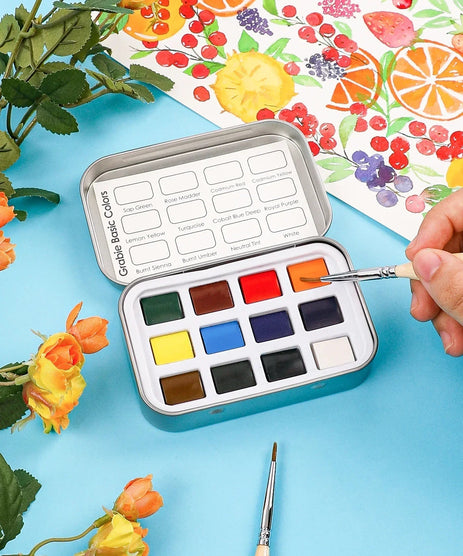 https://cdn.shopify.com/s/files/1/0729/6961/7689/files/Grabie_Watercolor_Pocket_Set_of_12_-_Essential_Colors_Grabie_Art_Supplies_Best_Watercolor_Artist_Watercolor_Miniature_Watercolor_Set.jpg?v=1772696350