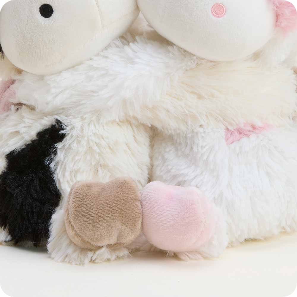 https://warmies.com/cdn/shop/files/HUGS-COW-1-hugs-Cow-2052.jpg?v=1769616995&width=1000
