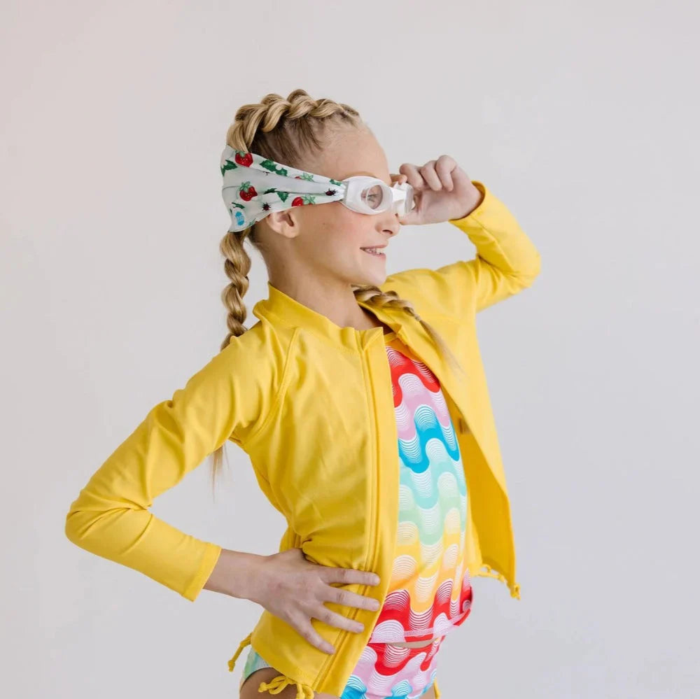 https://cdn.shopify.com/s/files/1/0682/2661/3385/files/Splash-Swim-Goggles-Strawberry-Fields-6.webp?v=1764106659
