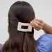 https://cdn.shopify.com/s/files/1/0065/8459/8593/files/almond-beige-small-flat-rectangle-hair-clip-hair-clips-164927.jpg?v=1750208340