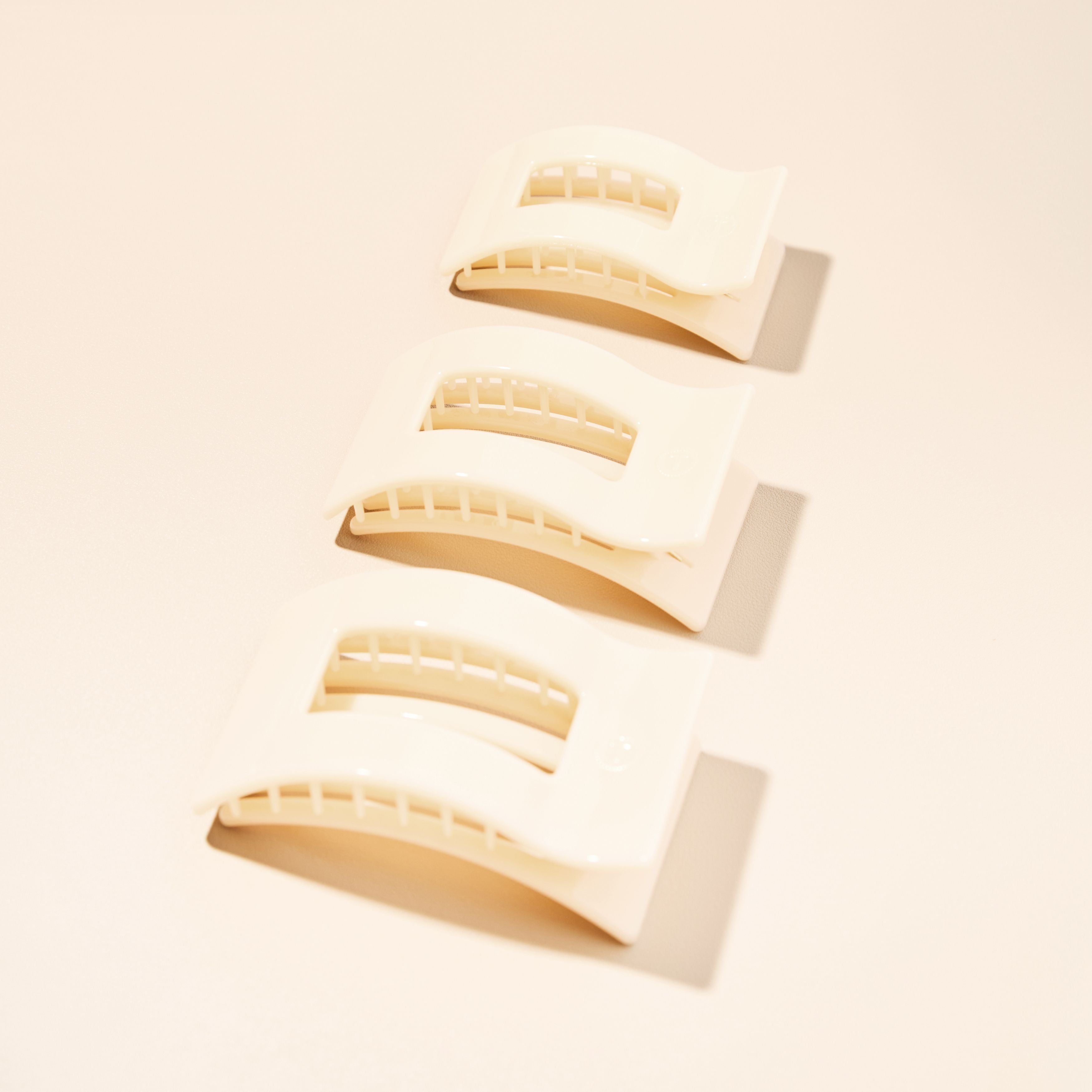 https://cdn.shopify.com/s/files/1/0065/8459/8593/files/almond-beige-small-flat-rectangle-hair-clip-hair-clips-540195.jpg?v=1750208341