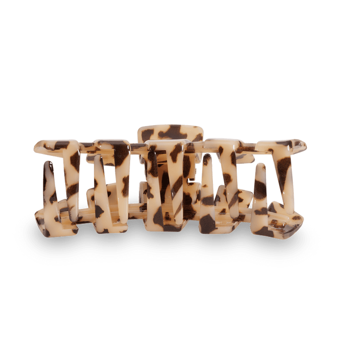 https://cdn.shopify.com/s/files/1/0065/8459/8593/files/classic-blonde-tortoise-large-hair-clip-large-hair-clip-554985.png?v=1715240467