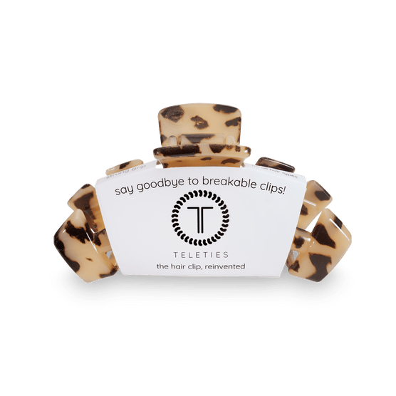 https://cdn.shopify.com/s/files/1/0065/8459/8593/files/classic-blonde-tortoise-medium-hair-clip-medium-hair-clip-498527.png?v=1715240467