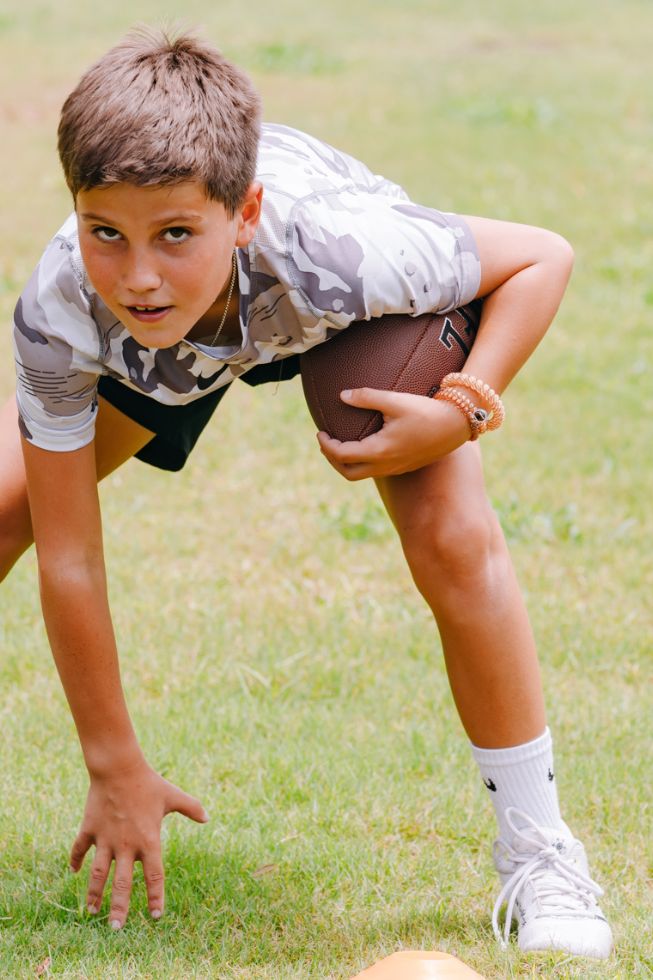 https://cdn.shopify.com/s/files/1/0065/8459/8593/products/football-large-141831.jpg?v=1763083127