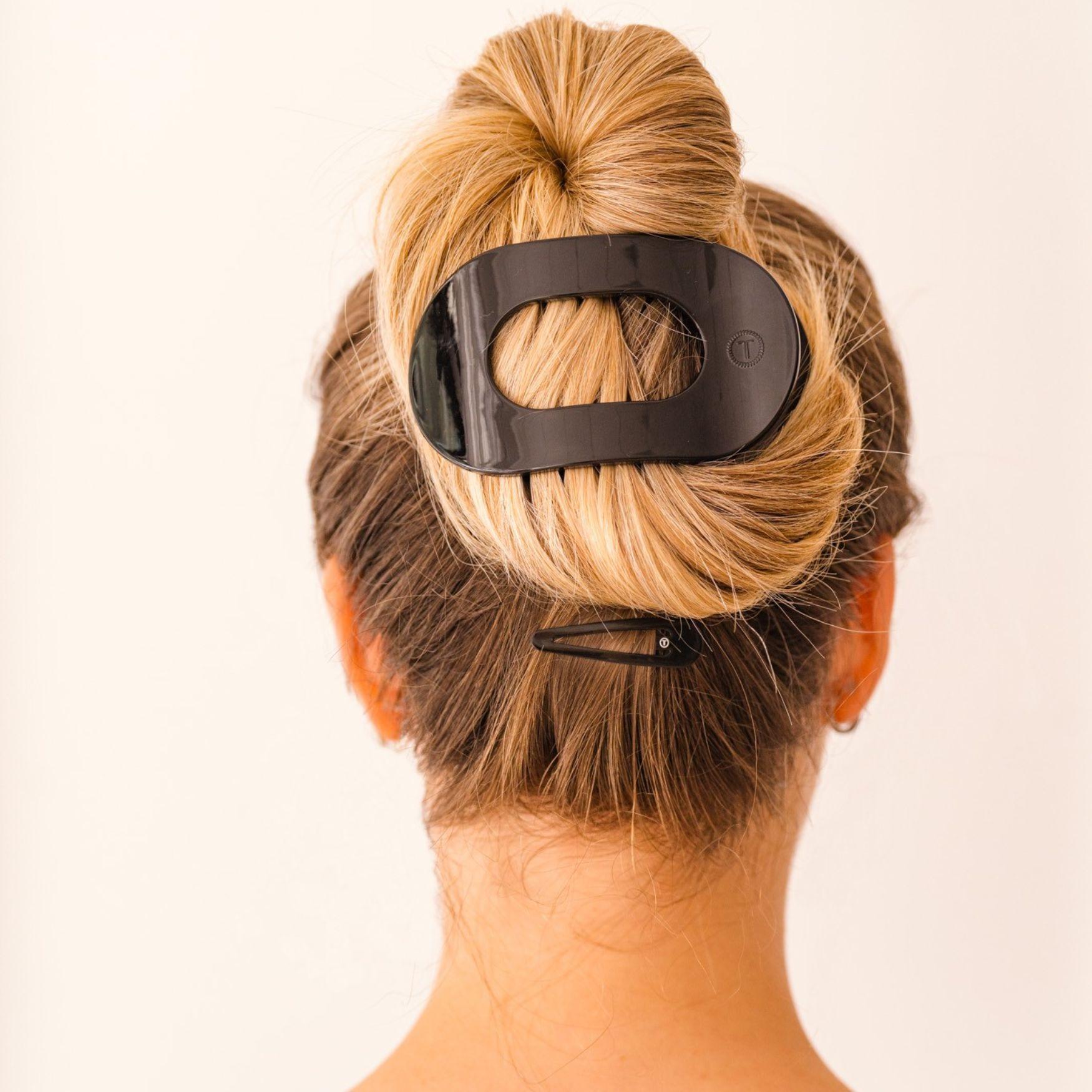 https://cdn.shopify.com/s/files/1/0065/8459/8593/files/jet-black-large-flat-round-hair-clip-hair-clips-165377.jpg?v=1747369870