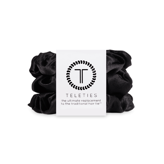 https://cdn.shopify.com/s/files/1/0065/8459/8593/files/jet-black-large-scrunchie-large-scrunchie-799337.png?v=1762199927