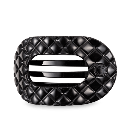 https://cdn.shopify.com/s/files/1/0065/8459/8593/files/jet-black-quilted-large-flat-round-hair-clip-hair-clips-6410445.png?v=1762201541