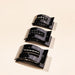 https://cdn.shopify.com/s/files/1/0065/8459/8593/files/jet-black-small-flat-rectangle-hair-clip-hair-clips-479389.jpg?v=1750208341