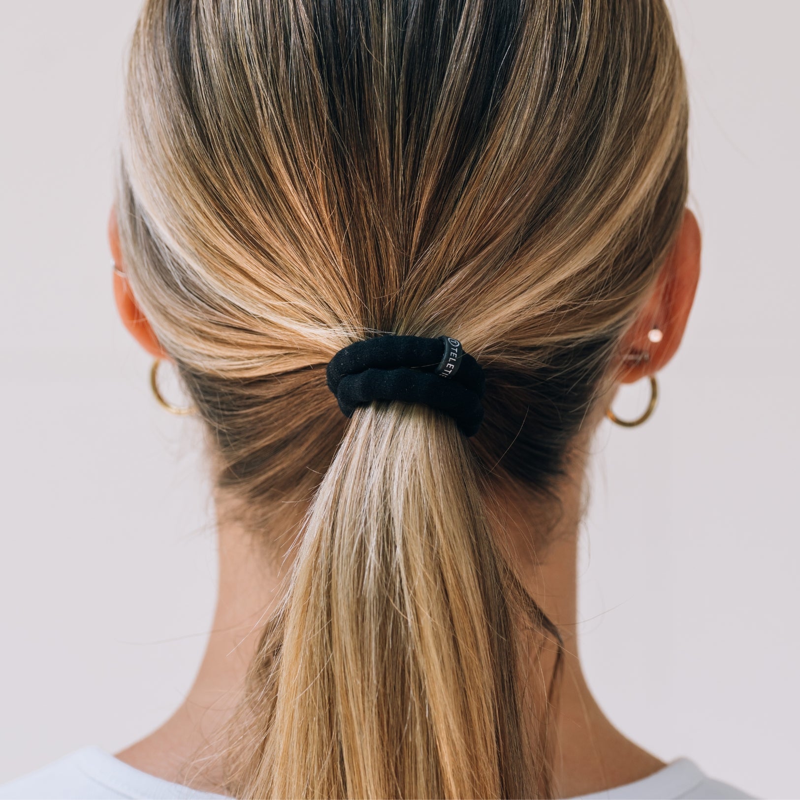 https://cdn.shopify.com/s/files/1/0065/8459/8593/files/jet-black-small-nylon-hair-ties-hair-ties-7931306.jpg?v=1758096627