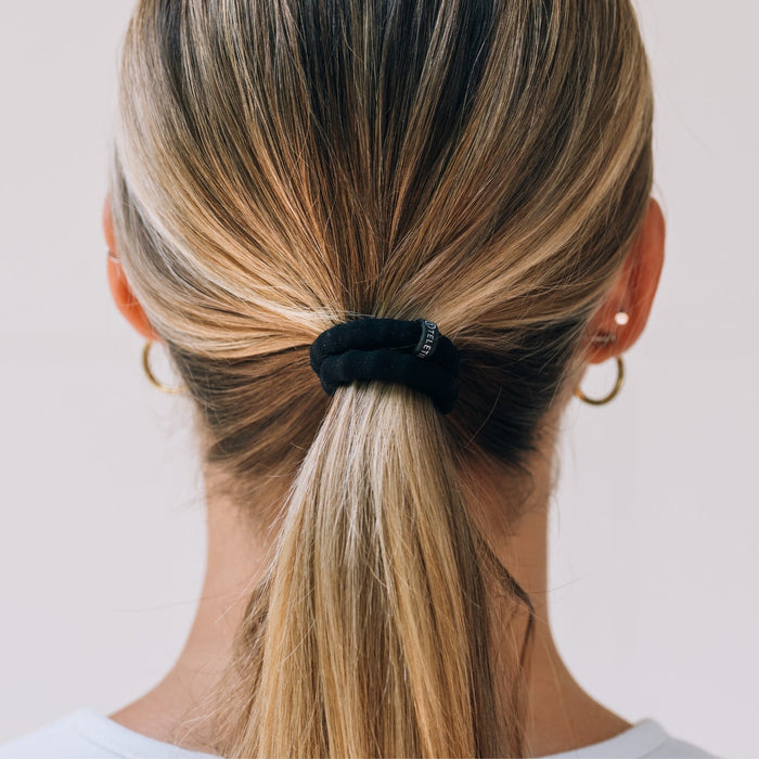 https://cdn.shopify.com/s/files/1/0065/8459/8593/files/jet-black-small-nylon-hair-ties-hair-ties-7931306.jpg?v=1758096627