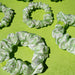 https://cdn.shopify.com/s/files/1/0065/8459/8593/files/lost-my-marbles-small-scrunchie-142157.jpg?v=1716387979