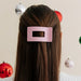 https://cdn.shopify.com/s/files/1/0285/6372/files/merry-pinkmas-medium-flat-rectangle-hair-clip-hair-clips-3394876.webp?v=1762630685