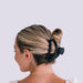 https://cdn.shopify.com/s/files/1/0065/8459/8593/products/open-jet-black-large-hair-clip-large-hair-clip-849786.jpg?v=1686691302