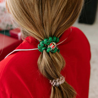https://cdn11.bigcommerce.com/s-u13xztxgtc/products/52365/images/89207/secret-santa-small-hair-ties-hair-ties-1664238__75822.1762806462.386.513.jpg?c=1