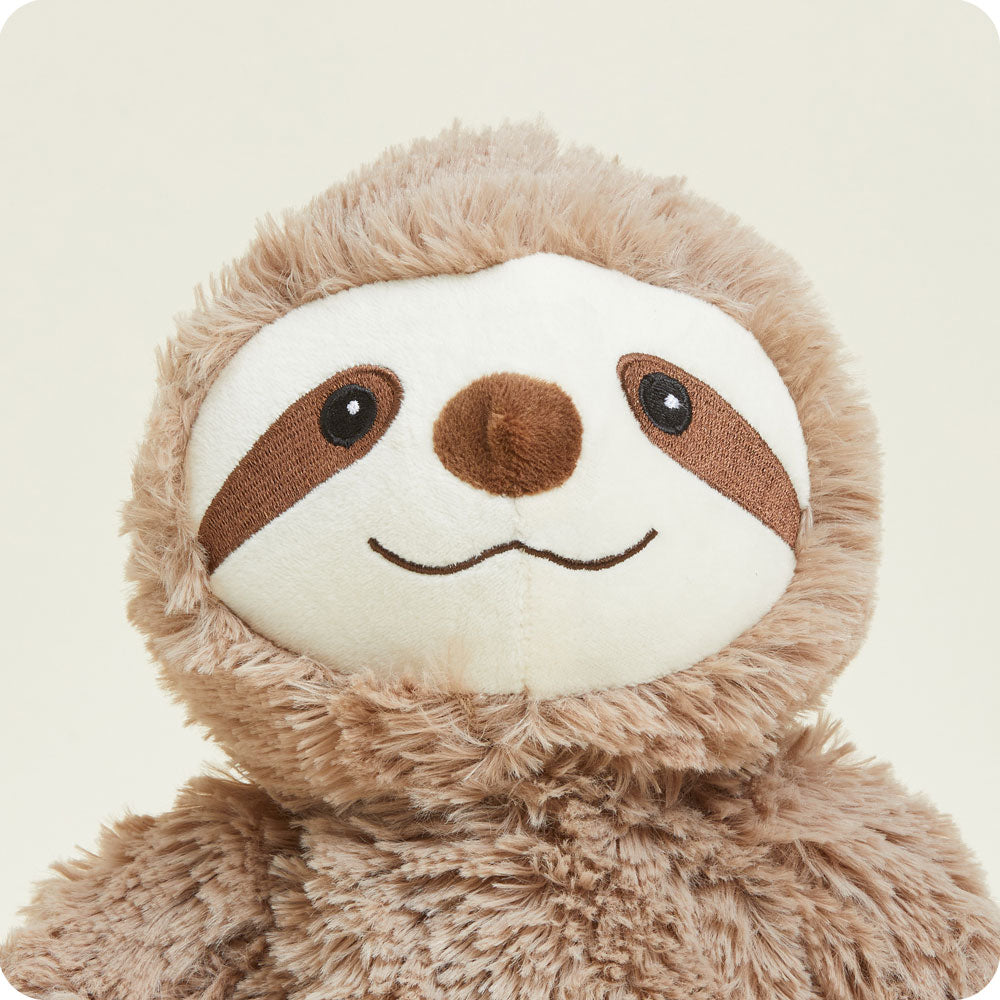 https://cdn.shopify.com/s/files/1/0284/0680/8664/products/sloth-stuffed-animal-warmies.jpg?v=1768427184