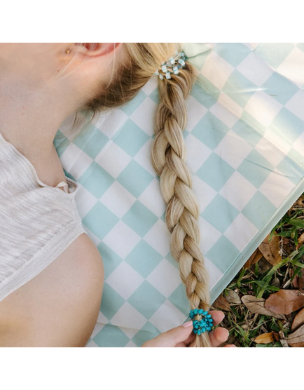 https://cdn.shoplightspeed.com/shops/636440/files/74601080/800x1024x2/teleties-soft-surf-large-hair-ties.jpg