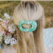 https://cdn.shoplightspeed.com/shops/636440/files/74597472/800x1024x2/teleties-spring-splash-medium-flat-round-hair-clip.jpg
